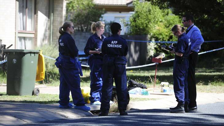Police investigate a suspicious death on Broad Place, Kambah after a 42-year-old woman was found in the front room of the home. Photo: Melissa Adams