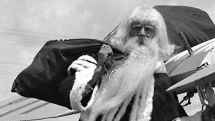 Santa Claus at the Canberra Airport circa 1929. Photo: Alexander Collingridge