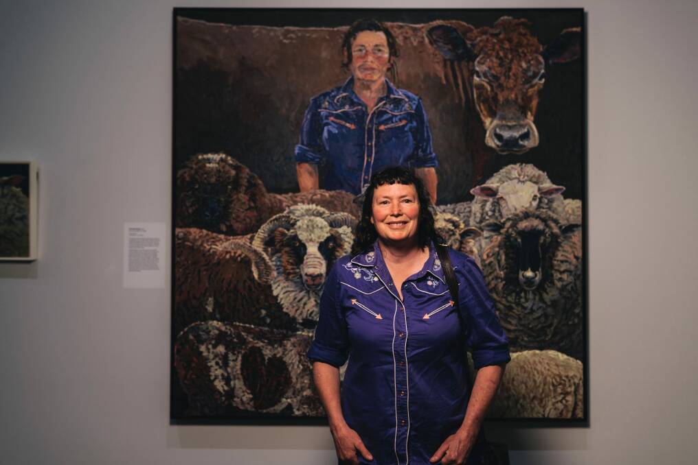 Lucy Culliton with her work <i>Self with friends</i>. Photo: Rohan Thomson