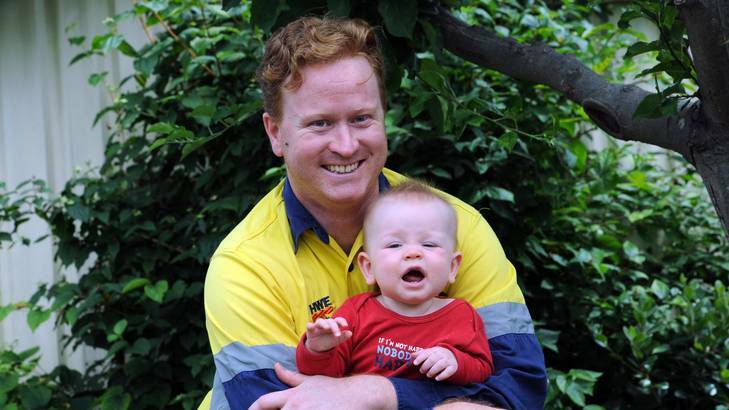 Martin Smith and his eight-month-old son, Lewin, at his home in Higgins. Photo: Graham Tidy