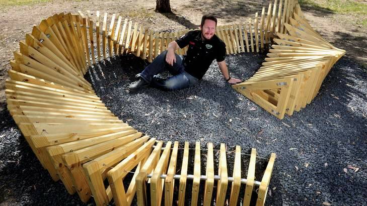 Artist Dan Stewart-Moore consulted with Uriarra residents on his sculpture incorporating 100 timber triangles. Photo: Melissa Adams