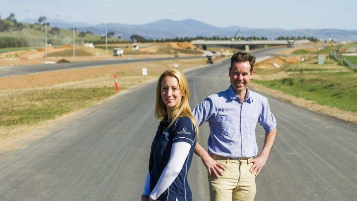 Lifeline Canberra boss Carrie Leeson and Mount Majura Winery winemaker Frank van de Loo check out the Majura Parkway ahead of a fun run to be held there in November. Photo: Jay Cronan