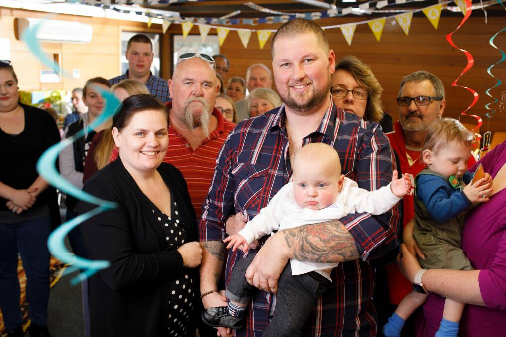 Kylie and James Wiggins celebrate the first birthday of their son, Dolton, with family and friends.  Photo: Sitthixay Ditthavong