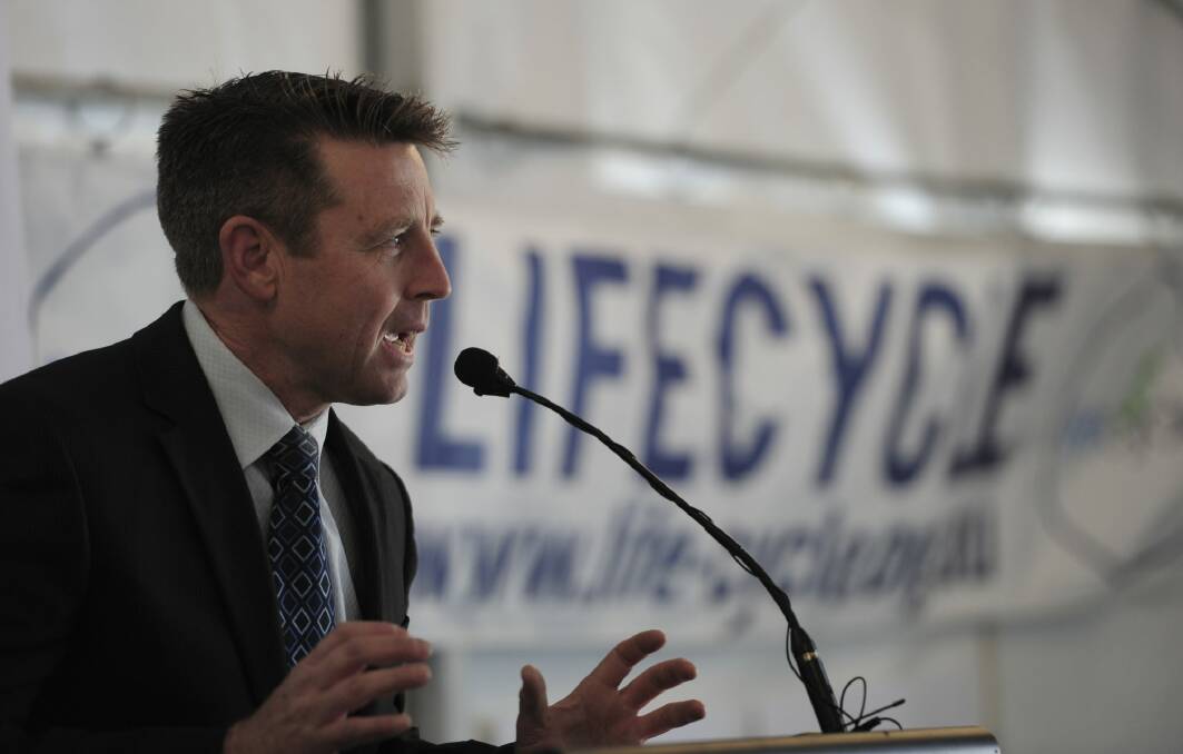 Lifecyle co-ordinator Mark Blake speaks at the ceremony at the John James Village site in Garran. Photo: Graham Tidy