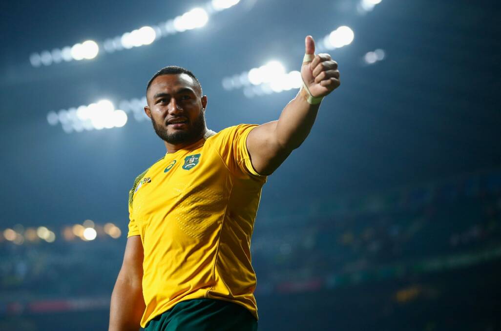 Proper job: Sekope Kepu of Australia celebrates after the victory over England. Photo: Getty Images
