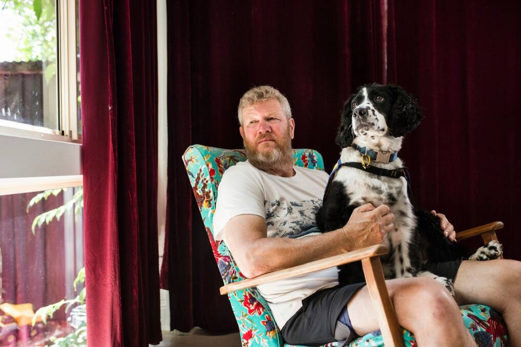 Michael Brideson with his assistance dog Ted.  Photo: Jamila Toderas