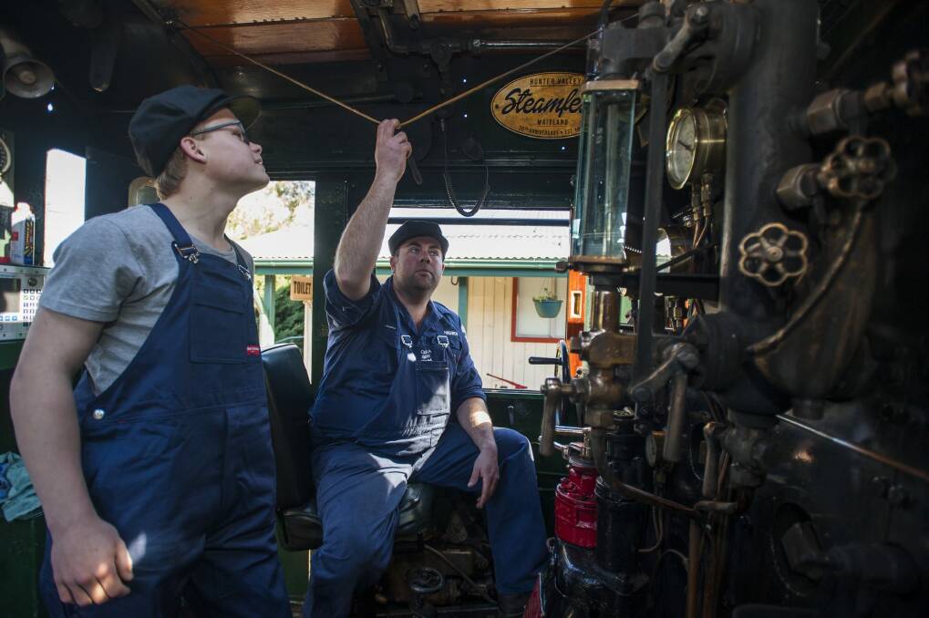 Mitchell Allen in the 6029, the largest steam train in the southern hemisphere, with Canberra Railway Museum operations manager Les Coulton. Photo: Elesa Kurtz