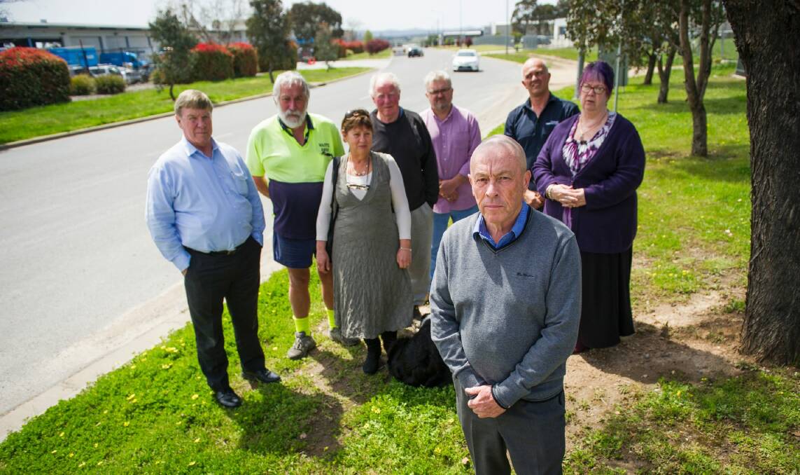 Mike Steele and members of the Hume Traders Association, Dennis Ogden, Stuart Craig, Robyn Barron, John Convine, Peter Terho, Richard Palmer and Kathryn Stefaniak who have come out against the proposed the largest plastic to fuel facility in Australia being built in Hume.  Photo: Elesa Kurtz