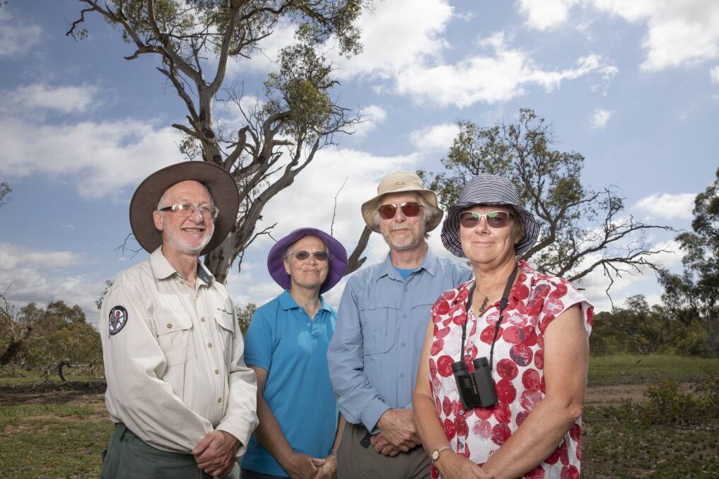 ACT government senior environmental planner Dr Michael Mulvaney and citizen scientists Jenny Tyrrell, Tom Tyrrell and Jacky Fogerty out looking for gang-gangs in Red Hill. Photo: Sitthixay Ditthavong