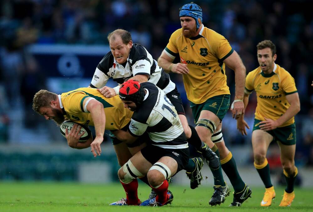Power pack: James Slipper takes the ball up against the Barbarians. Photo: Getty Images