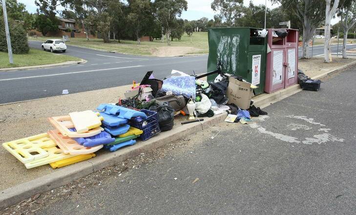 Rubbish dumped at the charity bins at the Cooleman Court shopping centre in Weston Creek. Photo: Andrew Sheargold