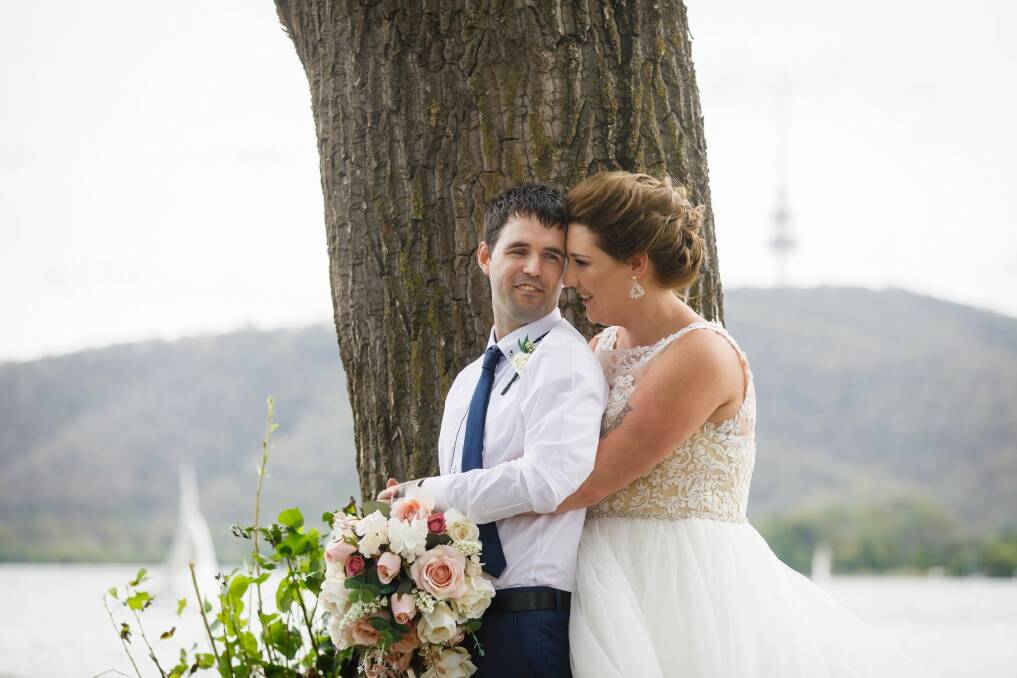 Matt and Danielle Pridham on their wedding day on Saturday.  Photo: Sitthixay Ditthavong