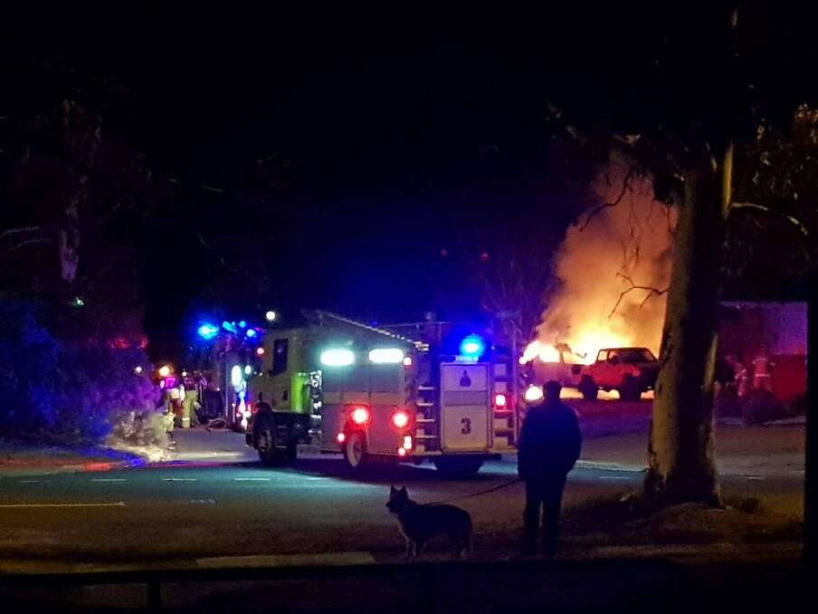 Emergency services respond to a car fire in Fisher. Photo: Supplied