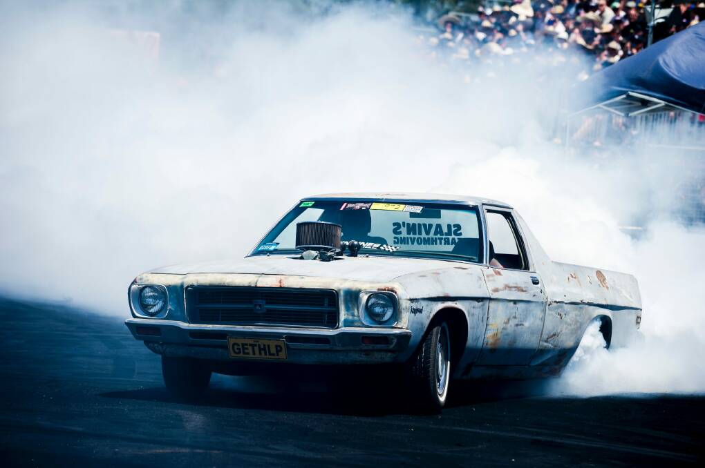 Cars compete in the burnout track at Summernats 31. Photo: Dion Georgopoulos