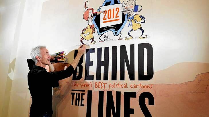 <i>Behind the Lines</i>, the annual travelling exhibition of Australian political cartoons, includes work by <i>The Canberra Times</i> cartoonist, David Pope. Photo: Melissa Adams