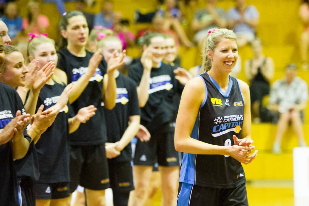 Carly Wilson celebrates her 350th game, Canberra Capitals vs Melbourne Boomers at Tuggeranong Stadium. Photo: Jay Cronan
