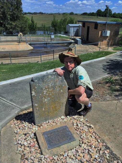Tim the Yowie Man reflects at Henry Dunkley's grave which commands extensive views over the Gunning Sewerage Treatment Plant. Photo: Gary Poile