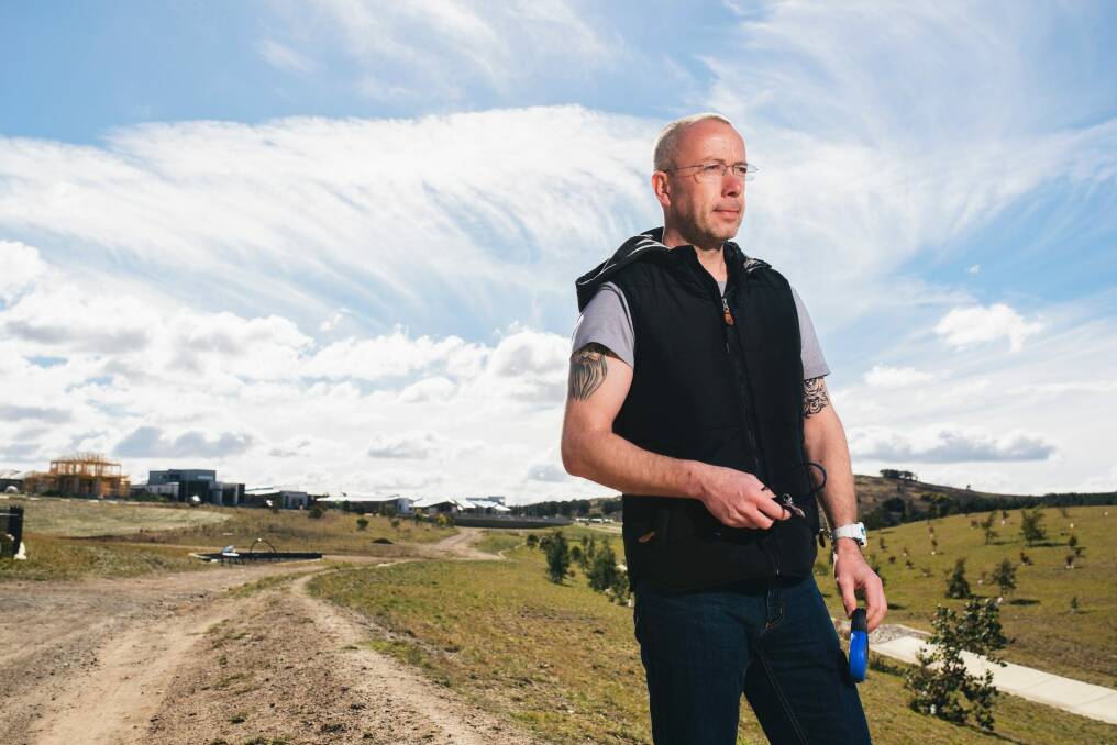 Steven Birchall at the site of the dog attack, where his poodle was mauled by two pit bulls. Photo: Rohan Thomson