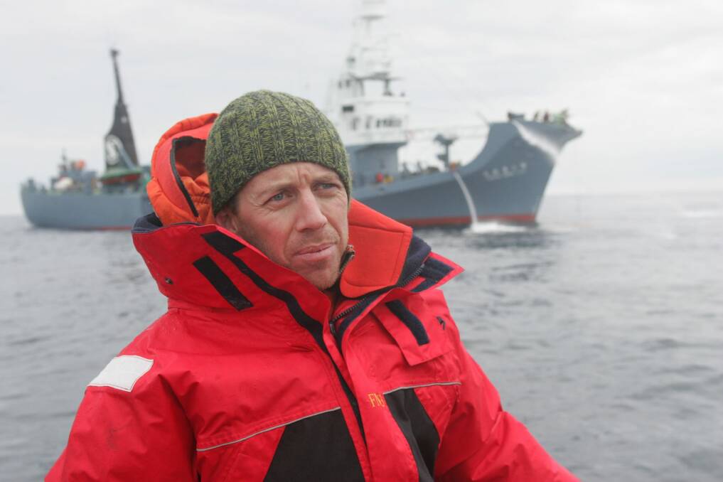 Shane Rattenbury, during his time at Greenpeace. He's in front of the Japanese hunter ship Yushin Maru No.2 whaling in the Southern Ocean. Photo: supplied