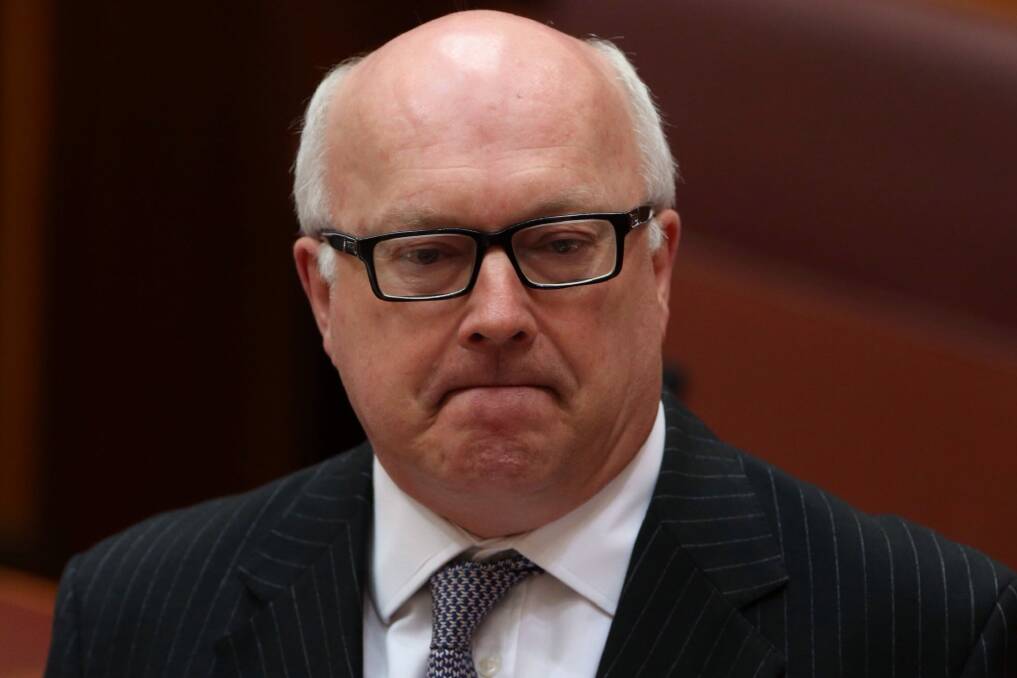 Attorney-General George Brandis said last month the government would do what it could to boost funding in a "tight fiscal environment". Photo: Andrew Meares