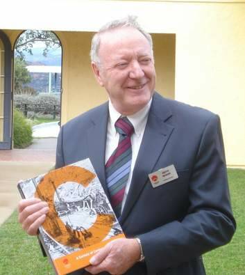 Keith Baker with his book <i>Canberra Engineering</i>. Photo: Supplied