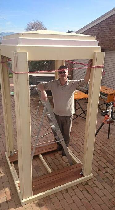 Bruce building the TARDIS at his home on Conder. Photo: Supplied