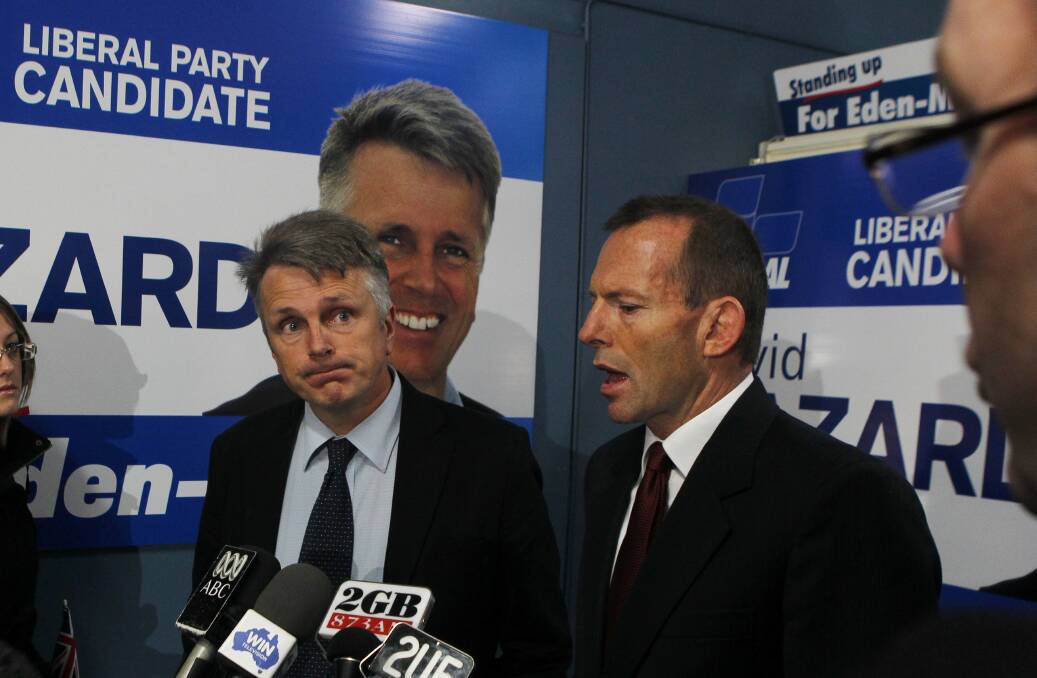 Tony Abbott pictured with David Gazard in 2010. Mr Gazard has been hired by the ACT Catholic Education Office. Photo: Glen McCurtayne