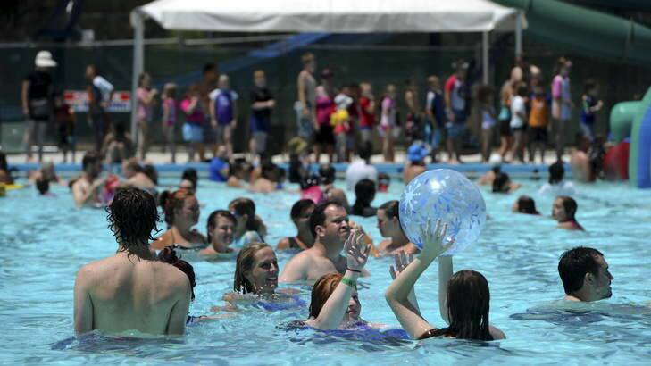 Canberrans escaping the heat at Big Splash in Macquarie. Photo: Graham Tidy