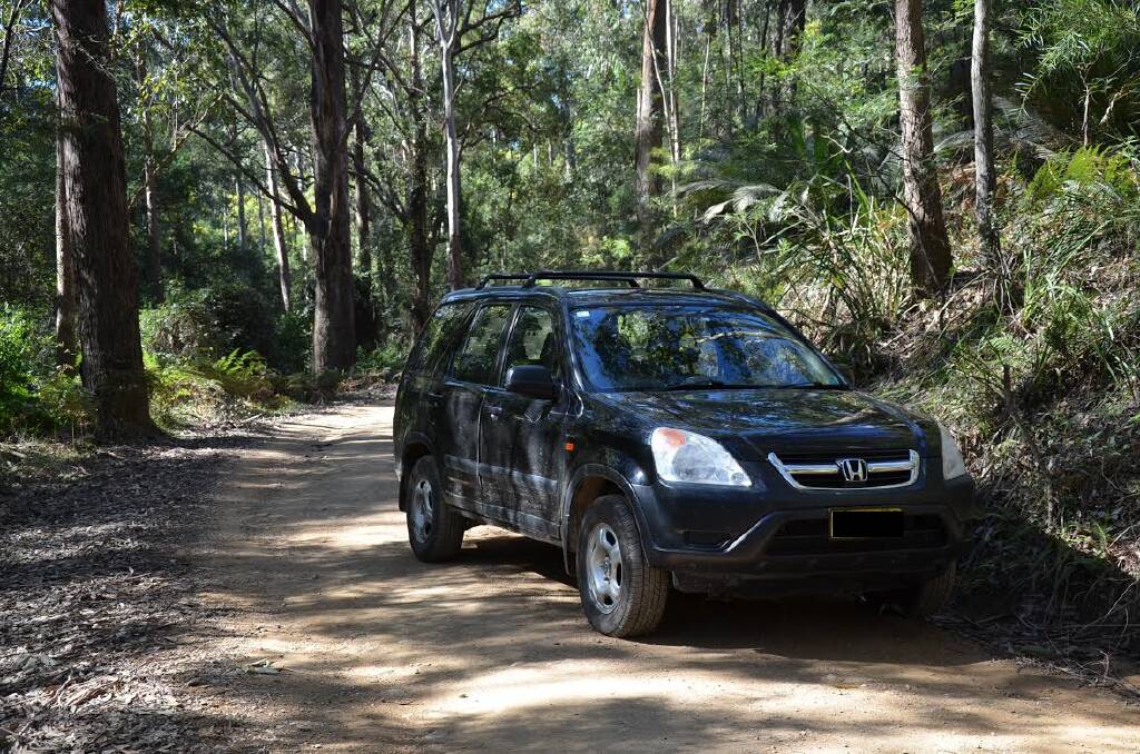 A car police say was used in the alleged abduction of an 18-month-old girl from Canberra. It was found on River Road near Nelligen. Photo: Josh Gidney - Batemans Bay Post