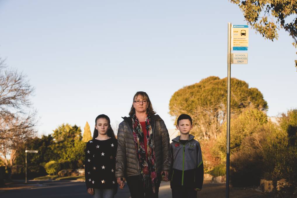 Melanie Wilson says she will have to change her work hours to drive her two children Molly 11, and Ben 8 (right) to school if their neighbourhood loses its dedicated school bus. Photo: Jamila Toderas