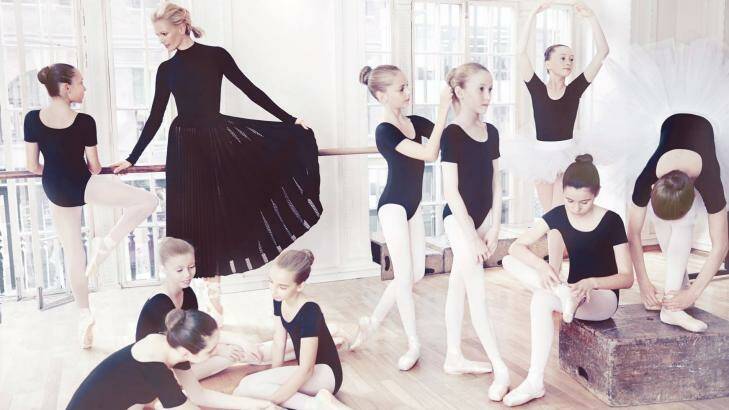 Former model and ballerina Sarah Murdoch poses with ballet students in her latest fashion spread for Vogue. Photo: Vogue.com.au