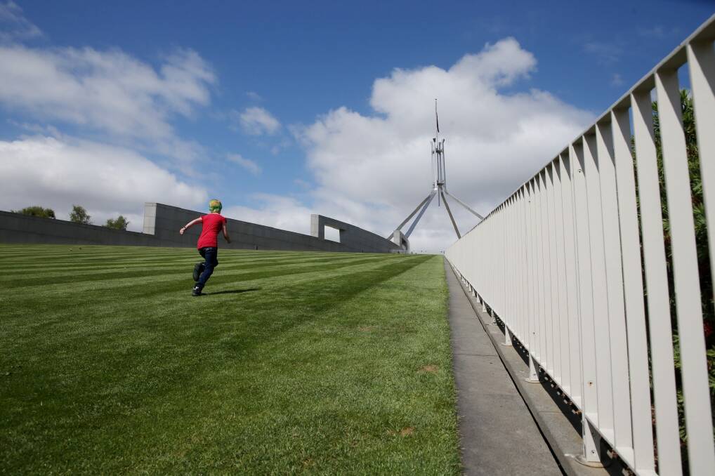 The new fence will cut across the lawns at the front of Parliament House. Photo: Andrew Meares