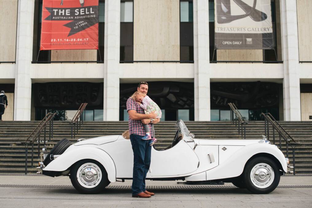 Canberra dad Peter and three-year-old daughter Chloe with their 1950 RMC Riley roadster.  Photo: Rohan Thomson