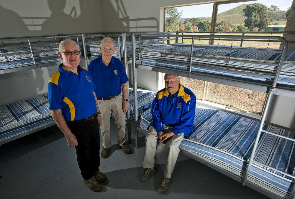 Peter Stapleton, Bruce May and Lions chairman Frank Brown in the new facility. Photo: Elesa Kurtz