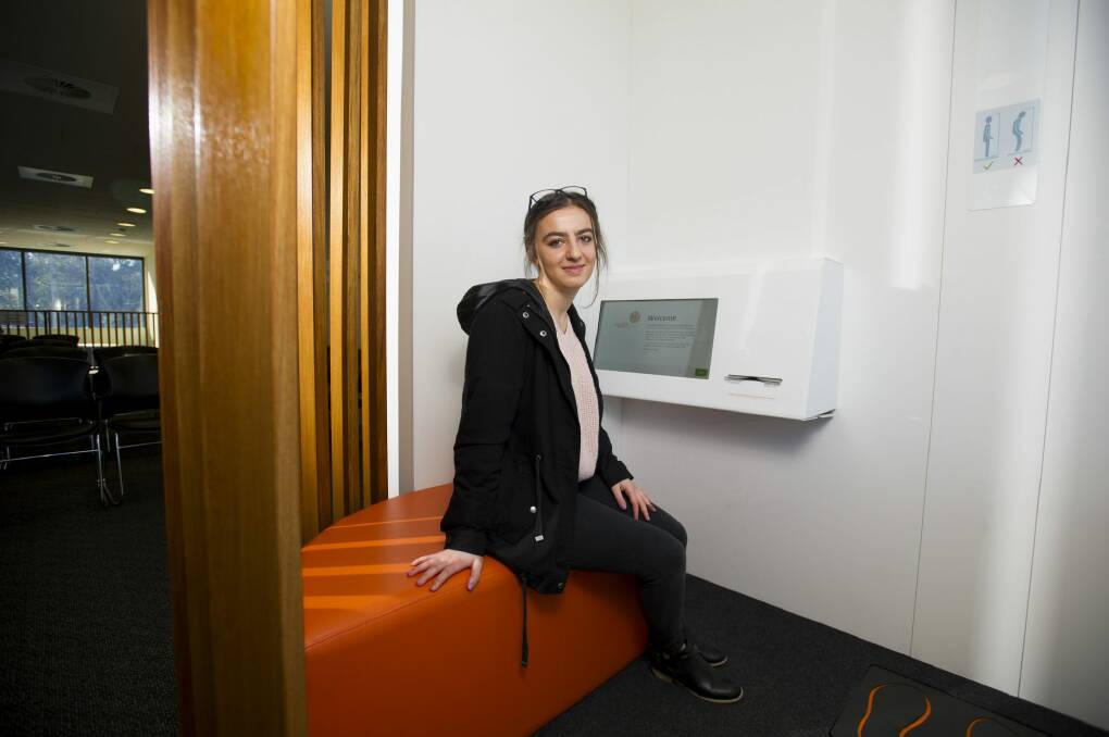 Sevin Pakbaz using the new automated 'pod' at The Ochre Health Medical Centre at the University of Canberra's Health Hub. Photo: Jay Cronan