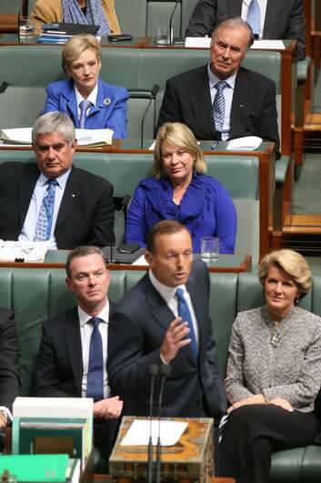 Jane Prentice sporting a blue tie sits behind then Opposition Leader Tony Abbott. Photo: Andrew Meares