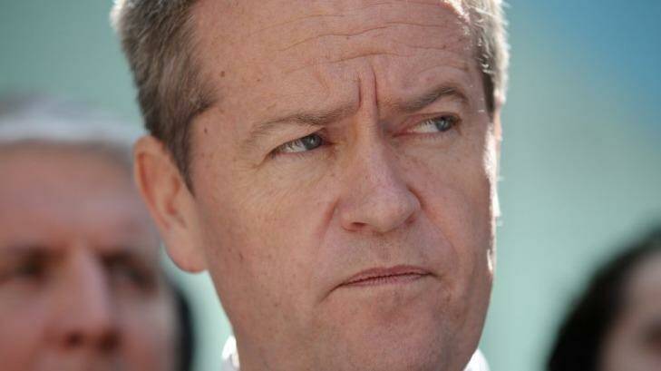 Labor leader Bill Shorten has warned Tony Abbott to keep his promises. Photo: Alex Ellinghausen