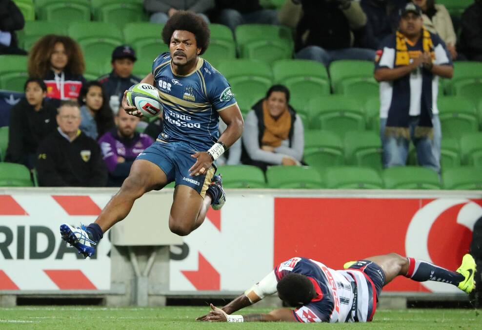 Henry Speight of the Brumbies runs in to score . Photo: Scott Barbour