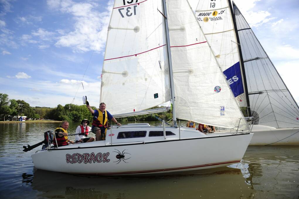 Front right, David Fogg, of Waramanga, sailing on Lake Burley Griffin in Canberra to support disadvantaged children and young people.  Photo: Melissa Adams