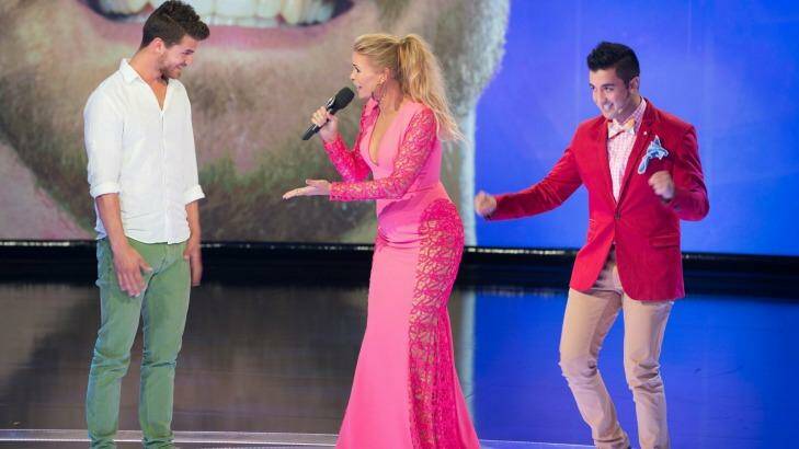 Moves: Jason Roses (right) on stage with host Sonia Kruger. Photo: Supplied
