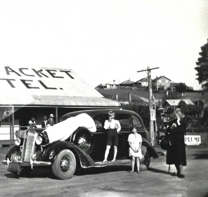 Albert Neuss’ 1936 Plymouth parked outside the Steampacket Hotel in Nelligen while his grandparents wait for the punt to take them across the Clyde River. Photo: Albert Neuss