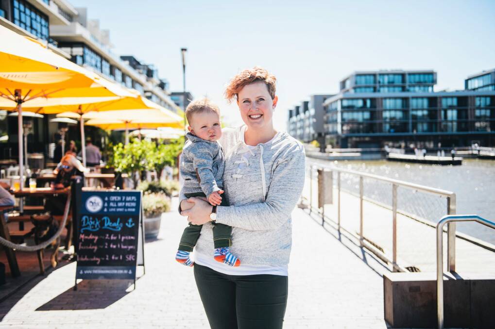Near-typical Canberran Pam Warner, 32, with 8-month-old Joey at Kingston Foreshore. Pam is almost a dead ringer for 'Lucy', the typical Canberran. Photo: Rohan Thomson