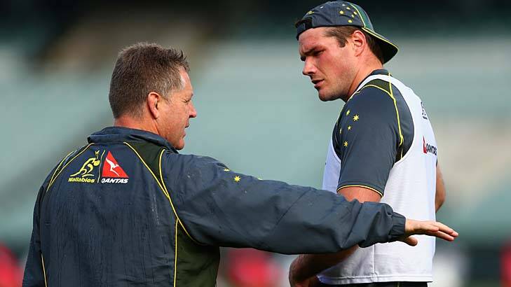 Wallabies assistant coach Andrew Blades has a word to captain Ben Mowen during a training session in Perth on Friday. Photo: Getty Images