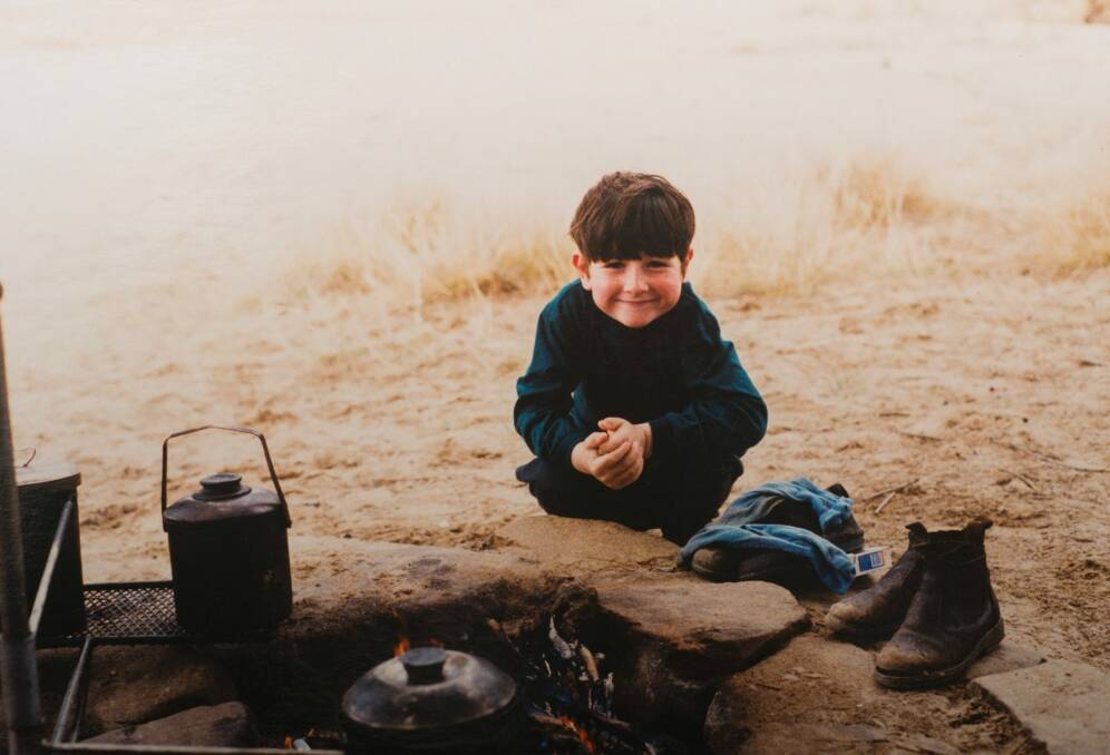 Paul Fennessy as a young boy out camping, after moving to Australia from Ireland when he was young. Photo: Rohan Thomson