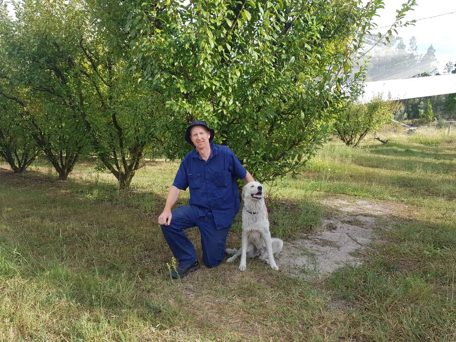 Farmer Brendon Dunn with his dog Christie. Photo: Supplied.