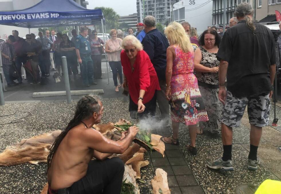 The smoking ceremony held to free the spirits of the 15 victims of the Whiskey Au Go Go fire bombing. Photo: Tony Moore