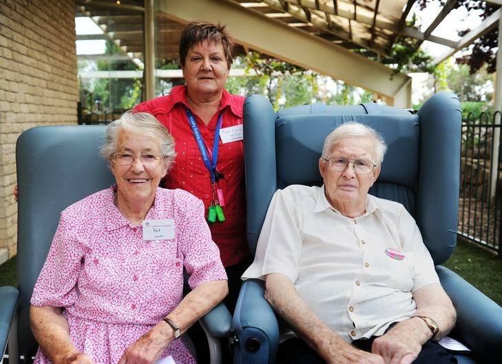 Carer Pat White, registered nurse Lyn Pascoe, and client Athol White at the opening of the Covenant Care Day Hospice at the Holy Covenant Anglican Church in Jamison. Photo: Rohan Thomson