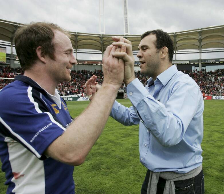 A fresh-faced Cheika celebrates a win over Toulouse with Denis Hickie in 2006. Photo: Getty Images