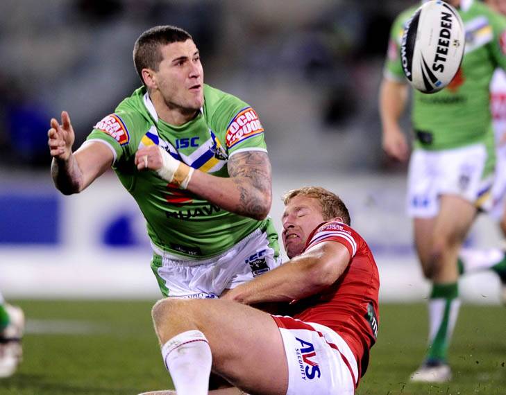 Battled on ... Joel Thompson completed the match despite reaggravating a hand injury. Photo: Melissa Adams
