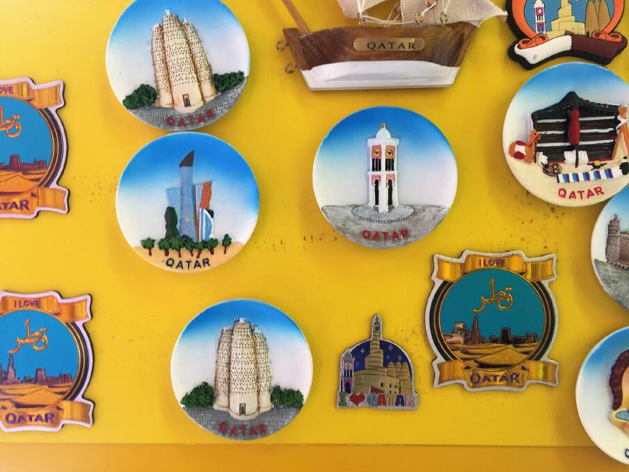 Magnets for sale at a tour agency office in Qatar.  Photo: Katie Burgess